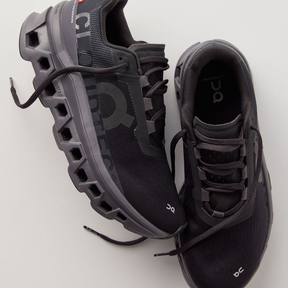 On Running Black Athletic Shoes with Sleek Design
